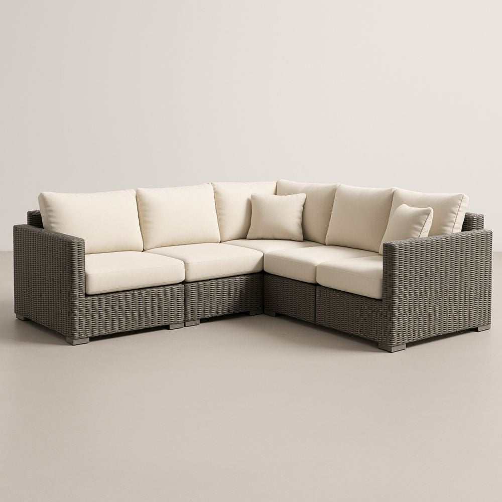 Canapé d'angle modulable extérieur résine tressée coussins crème