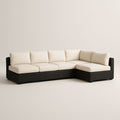Canapé d'angle modulaire extérieur en résine tressée noire avec coussins beige
